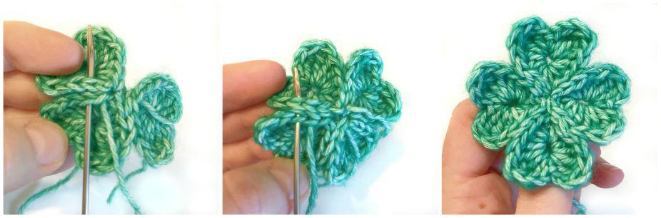 crochet shamrock being sewn together