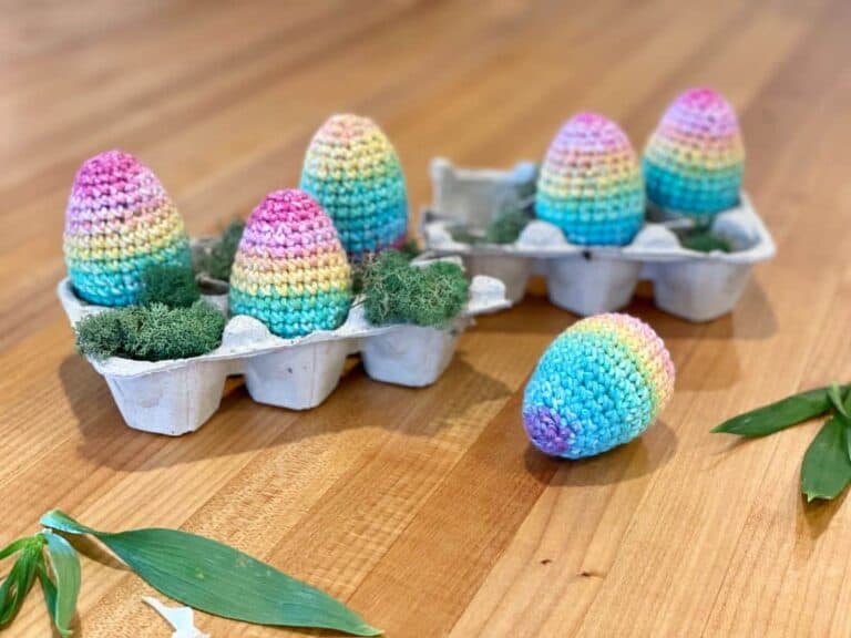 Easter eggs crocheted with rainbow yarn