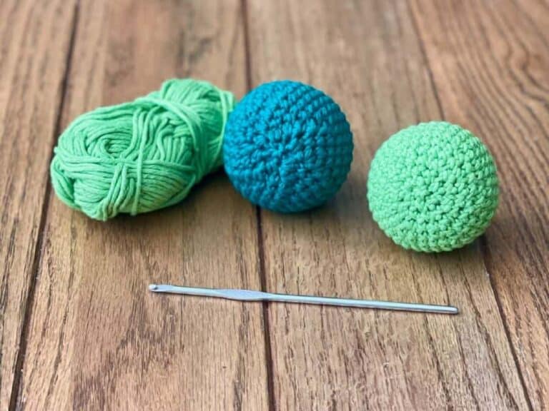 Two crochet balls made with different decrease techniques