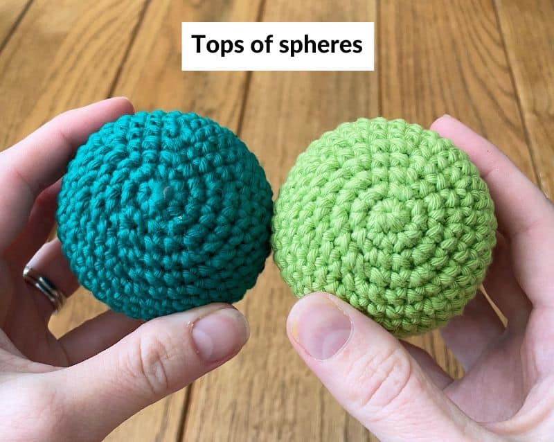 Two crocheted spheres